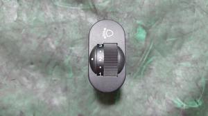 Кнопка переключателя корректора фар