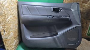 Обшивка двери передняя левая L G7