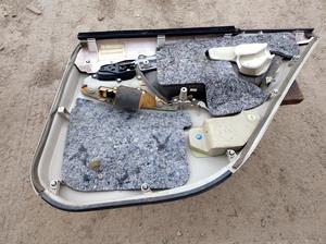 Обшивка двери задняя левая L TOYOTA Camry 67640-33820